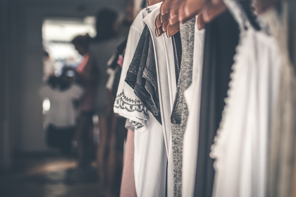 Soft garments hanging in a clothing atelier