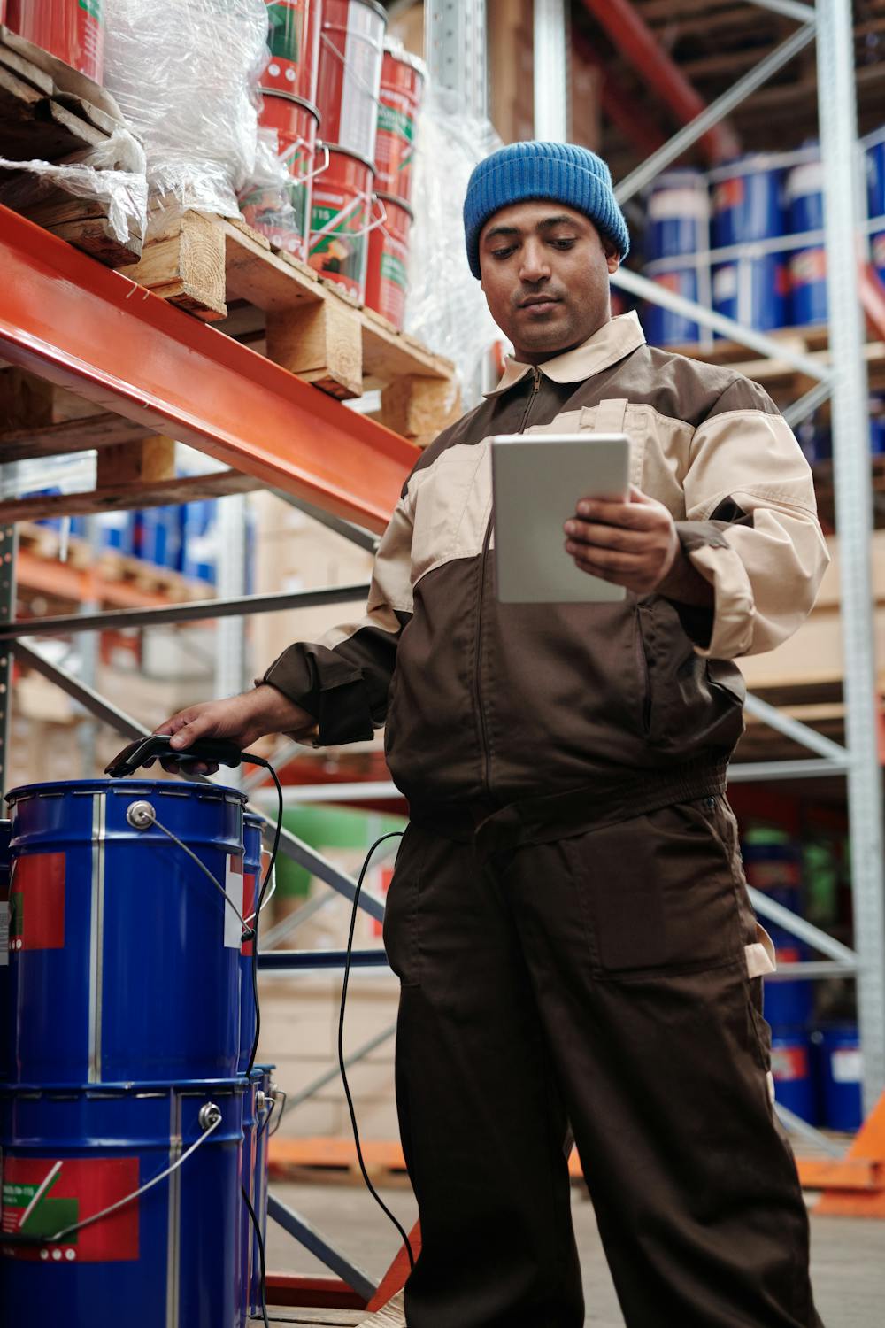 Warehouse worker using a tablet for inventory